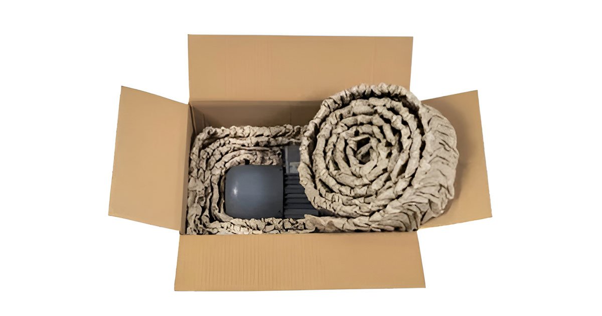 Cardboard box being packed with FROMM PC1000 paper cushions for protective packaging